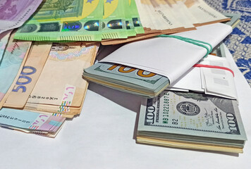 Packs of money US dollars Euro Ukrainian hryvnia. Ukrainian currency