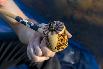 Indian smoking pipe with an image of a tiger
