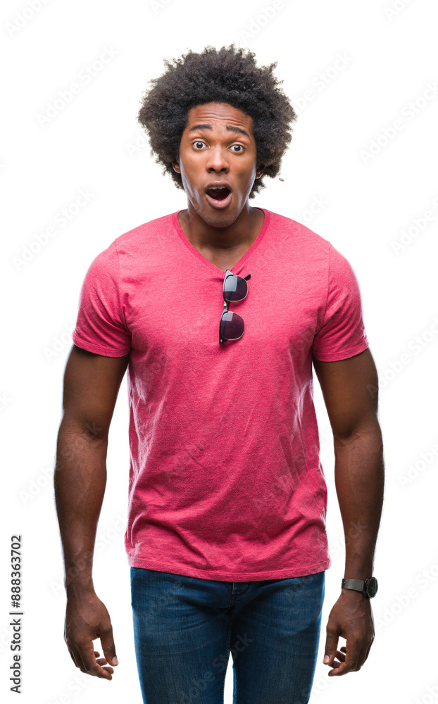 Canvas Prints Afro american man over isolated background afraid and shocked with surprise expression, fear and excited face.