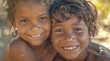 NORTHERN TERRITORY A portrait of two beautiful young aboriginal kids with smiling faces.