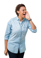 Young beautiful african american woman over isolated background shouting and screaming loud to side with hand on mouth. Communication concept.