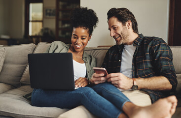 Couple, relax and internet with technology on sofa for social media, streaming subscription and online shopping for apartment. Man, woman and together in home with laptop, smartphone and connectivity