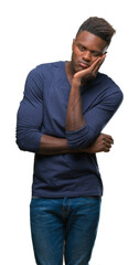 Fototapeta premium Young african american man over isolated background thinking looking tired and bored with depression problems with crossed arms.