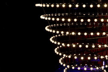 A simple and modern chandelier decorated with many round light bulbs