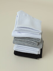 Socks on a gray background, stack of laying