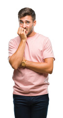 Young handsome man over isolated background looking stressed and nervous with hands on mouth biting...