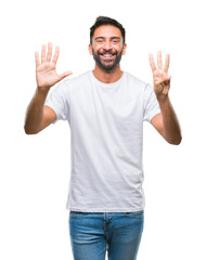 Adult hispanic man over isolated background showing and pointing up with fingers number eight while smiling confident and happy.