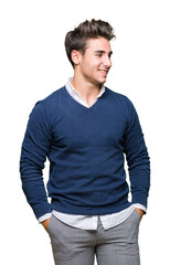 Fototapeta premium Young handsome business man over isolated background looking away to side with smile on face, natural expression. Laughing confident.