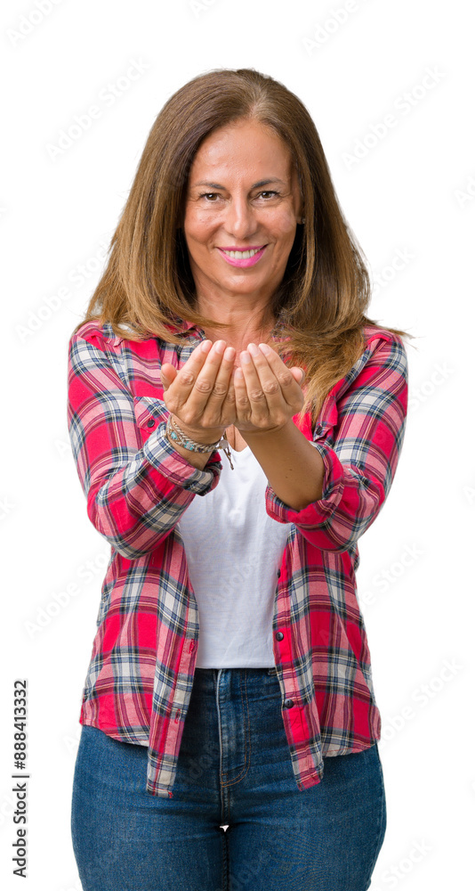 Wall mural beautiful middle age woman wearing over isolated background smiling with hands palms together receiv