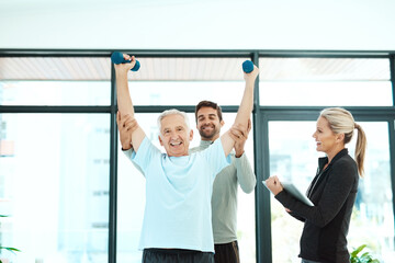Senior man, woman and physiotherapy in exercise in elderly care, retirement and fitness center for healing. Physiotherapist, patient and physical training in weightlifting, rehabilitation and trainer
