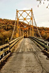 Fototapeta premium Beautiful Rustic Golden Bridge View in Autumn in the Midwest Heartland of America