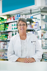 Woman, mature and pharmacist portrait in pharmacy, trust and drug store or medication dispensary. Healthcare, worker and medicine retailer for career, medical consultant and professional for wellness