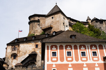 Orava Castle-Slovakia-07.07.2024: castle on a mountain among green leaves