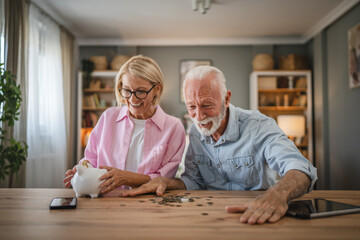 Senior couple count money from the piggy bank and save money together