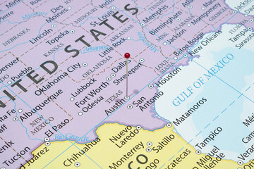 Close up to a Austin city with a red pin needle into United States of America country political map 