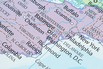 Macro photography of Washington DC city into political United States of America map with important cities