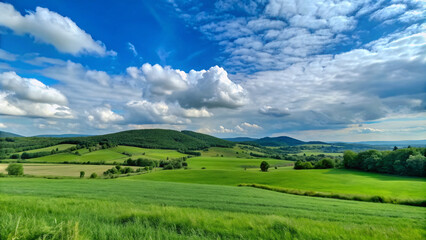 Obraz premium natural destination panoramic landscape, green grass field, Hills and mountains