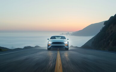 Sleek White Car Driving on Scenic Coast Highway at Twilight with Mountains in Background