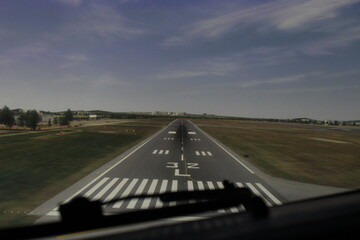 Fototapeta premium the runway as viewed from the aircraft simulator just before landing