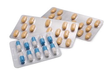 Different antibiotic pills in blisters isolated on white