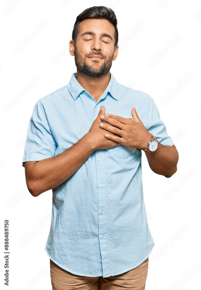 Canvas Prints handsome hispanic man wearing casual clothes smiling with hands on chest with closed eyes and gratef