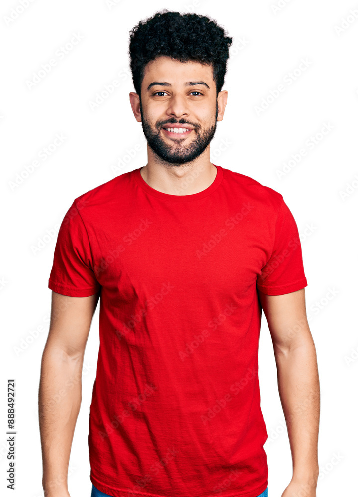 Sticker young arab man with beard wearing casual red t shirt with a happy and cool smile on face. lucky pers