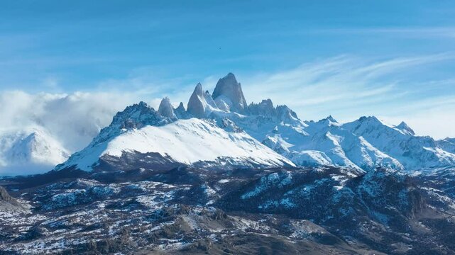 Fitz Roy Mountain At El Chalten Patagonia Argentina. Aerial View Of Massive Glacier Calves Into A Lagoon Of Icy Water. Snow Fall Lake Glacial Landscape Exploring. Glacial Landscape.