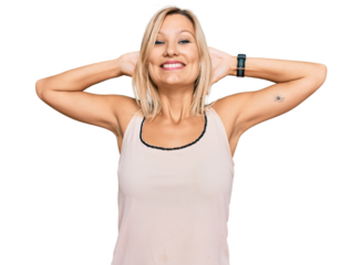 Middle age caucasian woman wearing casual clothes relaxing and stretching, arms and hands behind head and neck smiling happy