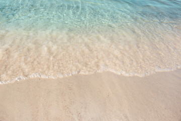 Sea waves rolling on beautiful sandy beach. Summer vacation