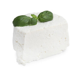Fresh ricotta (cream cheese) and basil isolated on white