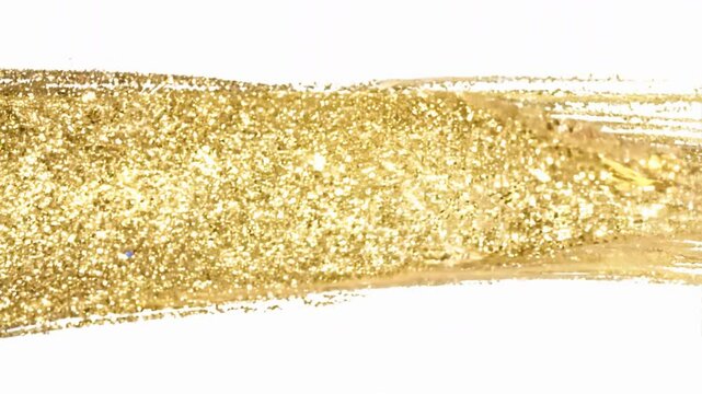 Gold bronze glitter brushstroke painting smear blot foil pieces. Abstract glow shine stain on white background.
