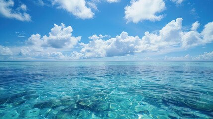 Obraz premium Azure Ocean and Fluffy Clouds on a Sunny Day