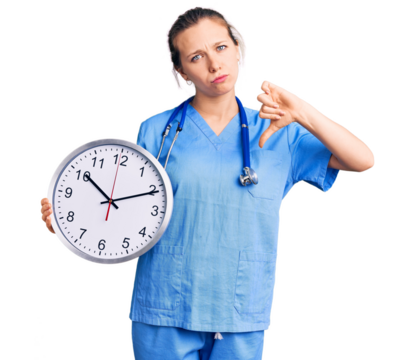 Young beautiful blonde woman wearing doctor uniform and stethoscope with angry face, negative sign showing dislike with thumbs down, rejection concept