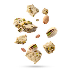 Sweet pistachio halva and nuts in air on white background