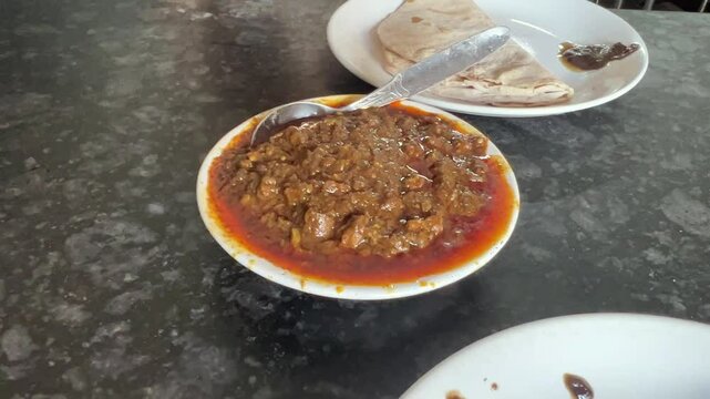 Mutton keema with roti prepared in Bengali style in Kolkata.