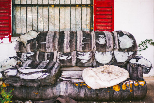 Ruined couch outside an abandoned home in the Florida panhandle