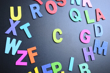 colorful letter alphabet on black background, object for education