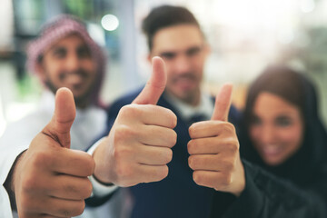 Business people, diversity and hands with thumbs up for good job, teamwork or positive feedback at office. Closeup of employees with smile, like emoji or yes sign for well done, thank you or review