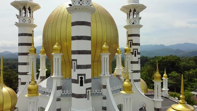 Aerial view close up of a beautiful mosque (Masjid Ubudiah) in Perak, Malaysia