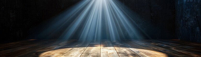 Isolated stage spotlight on wooden floor, ideal for theater performances.