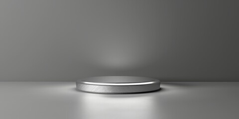 Round Silver Podium with Spotlight on Grey Background