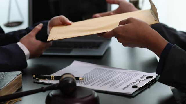 Lawyers and legal advisors submit signing documents and contract agreements.