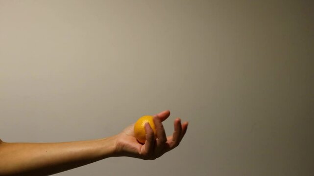 Throwing and Catching an Orange