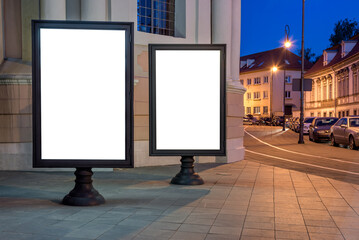 Mockup Of Two Wooden Billboards On The Pavement At Night. Empty Street Advertising Displays Next To Church