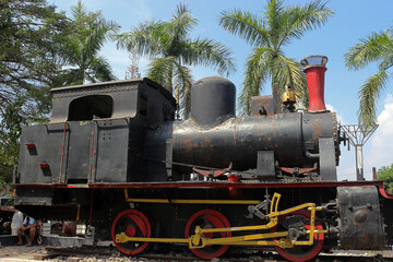 Naklejka premium Side view of a steam locomotive used as transportation in wood exploitation activities from the Cepu forest area in 1915 - 2010