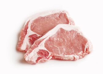 Sliced Raw Pork Loin on White Background（スライスされた生肉の豚ロースと白背景）