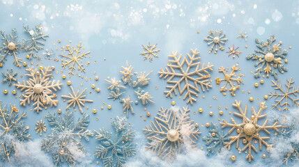 Various decorative snowflakes on a blue background, creating a festive winter scene.