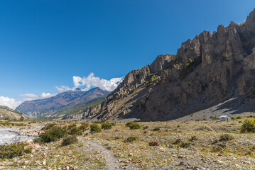 Beautiful mountainscape of the Himalayas with blue-sky background. Amazing mountain landscape view of Nepal