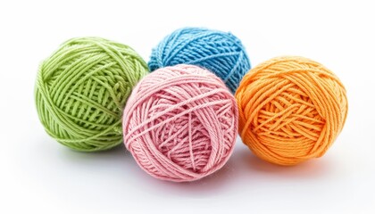 Set of five cotton thread balls in various colors isolated on white background