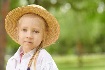 blonde girl in a hat
